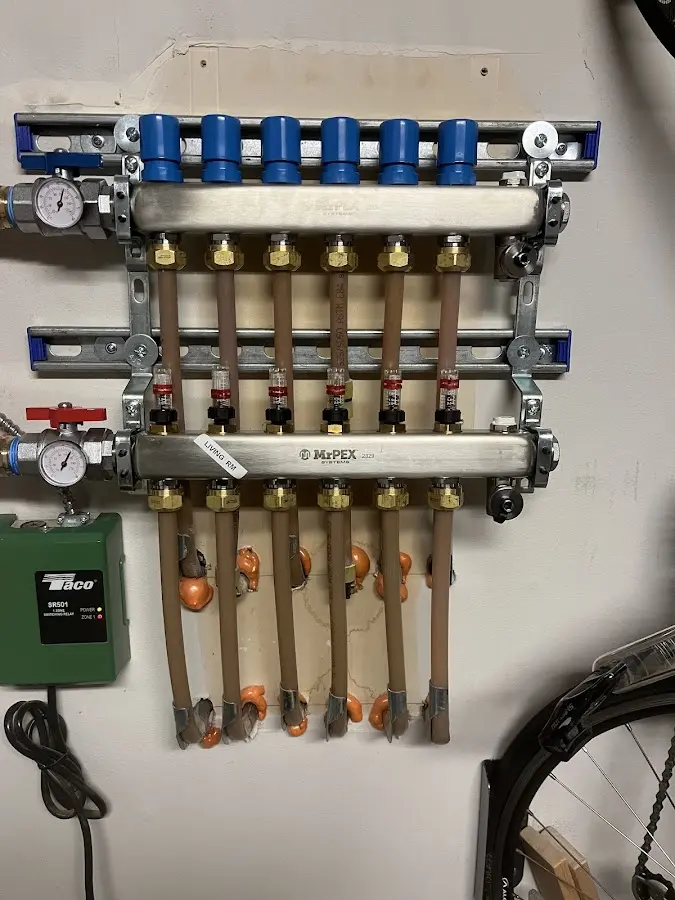 Plumber performing Water Heater Repair at a residential property in Planada